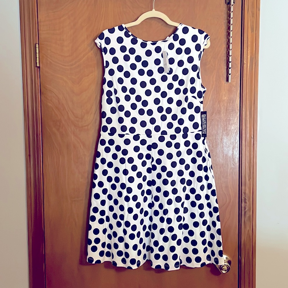 White with blue polka dot midi with slit pockets.